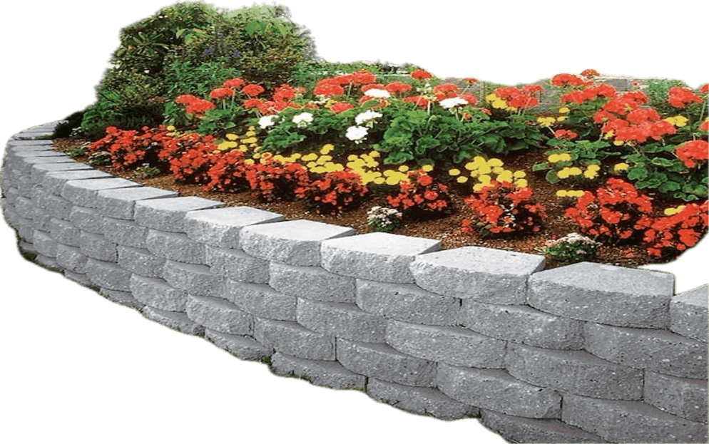 A stone retaining wall adorned with vibrant flowers, showcasing a blend of natural beauty and sturdy construction in Lakeland, FL